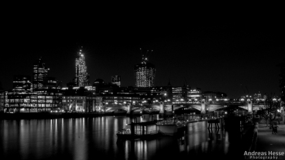 The skyline around the northbank of London Bridge shot from the southbank end of Millenium Bridge